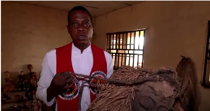 Nigeria Catholic Priest saves idol artifacts from fire